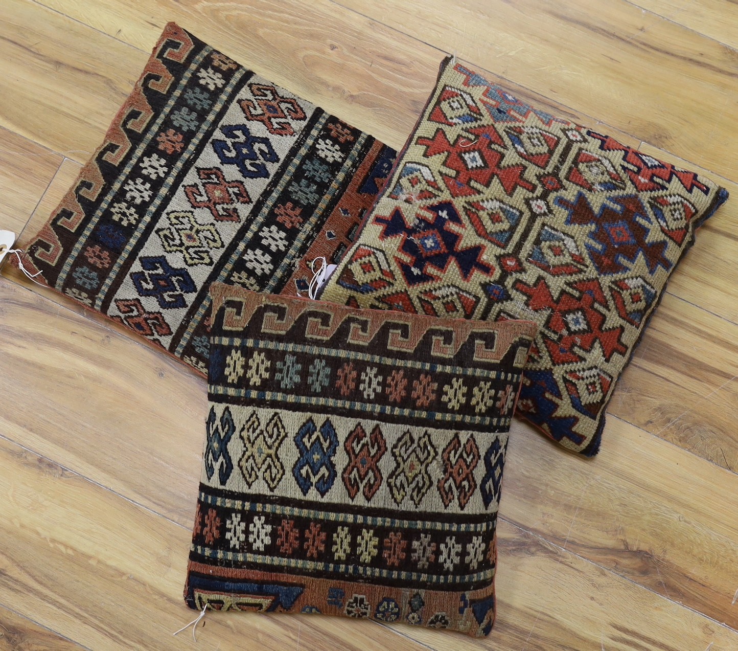 A pair of Soumac cushions, 14